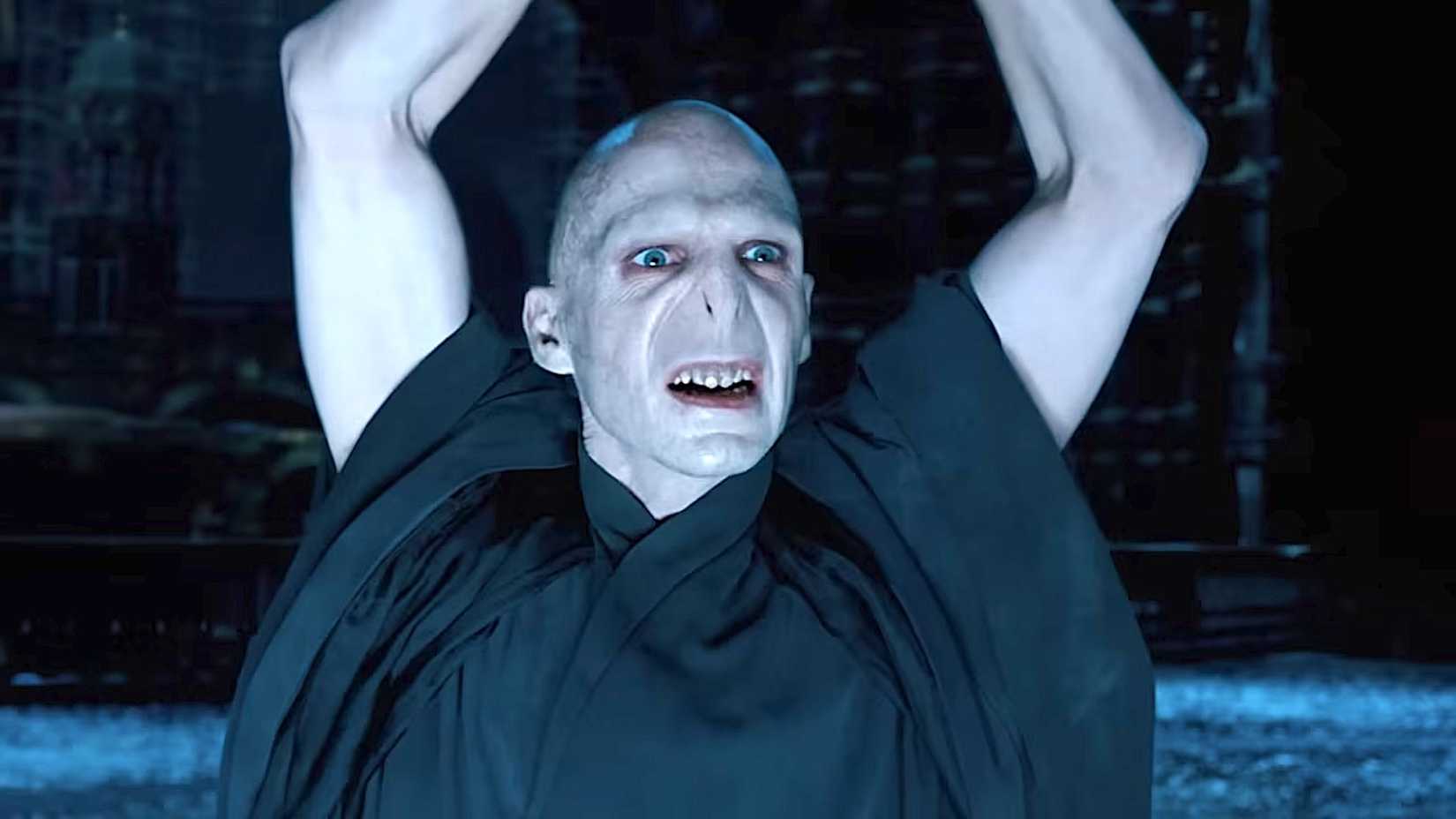 Voldemort (Ralph Fiennes) holding up his arms in 'Harry Potter and the Order of the Phoenix'
