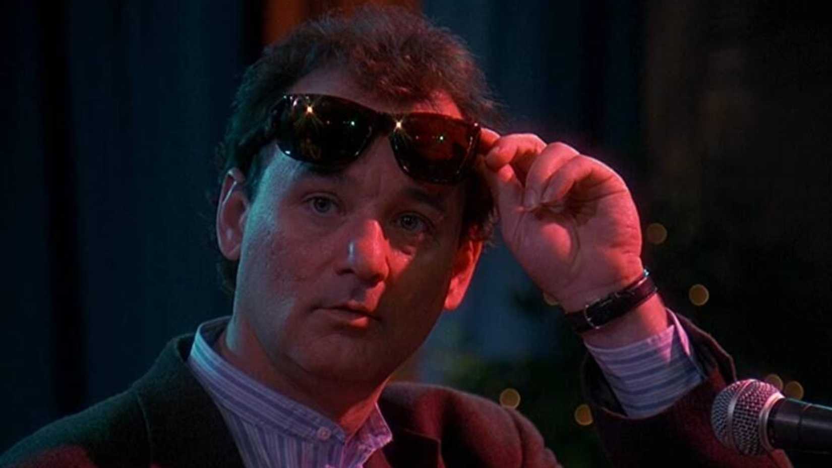 Phil lifts his sunglasses in Groundhog Day