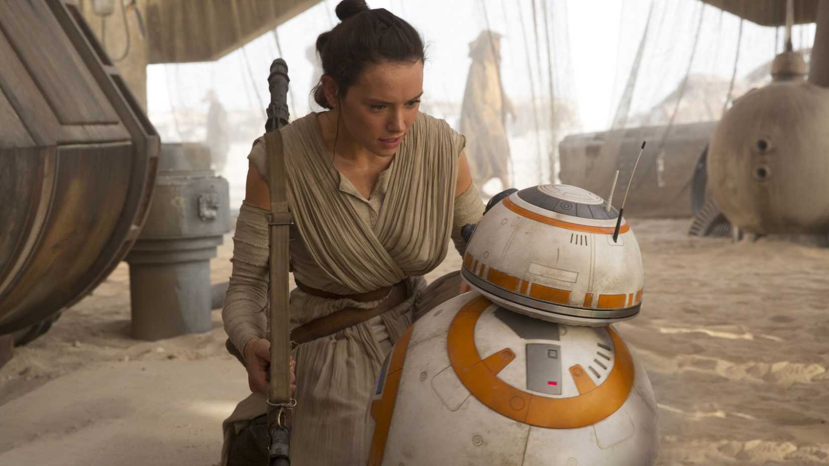 Daisy Ridley as Rey in Star Wars: The Force Awakens with BB-8