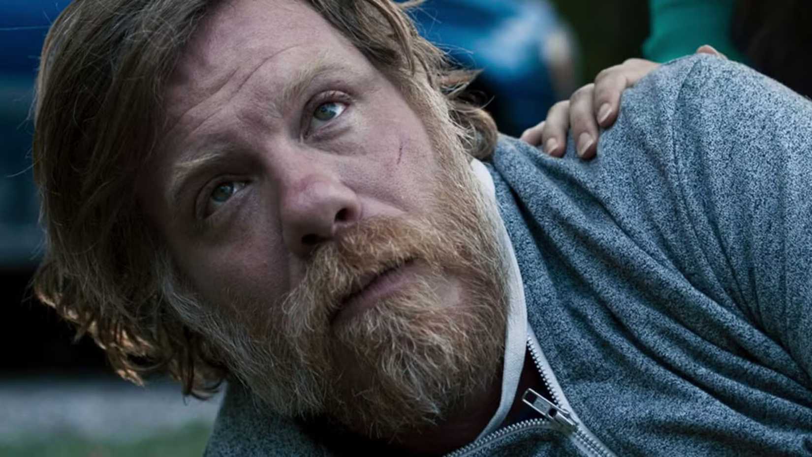 Russ lies on his side in Ozark