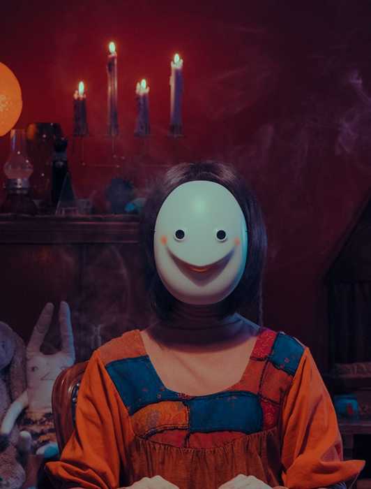 A mysterious tarot reader wearing a mask in the Million-Follower Detective