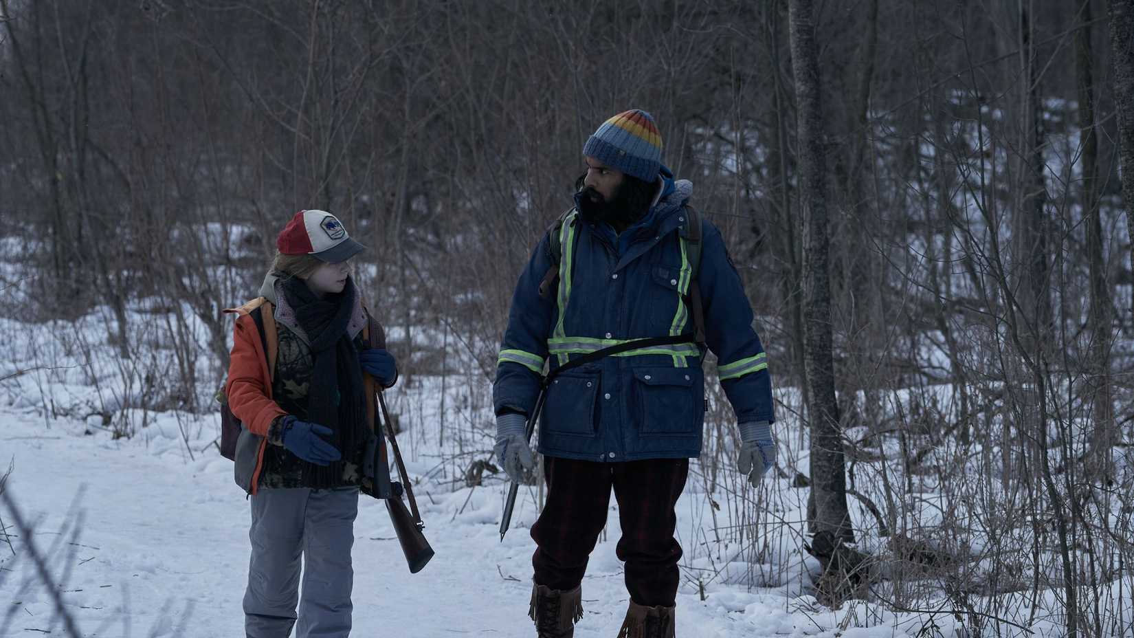 Matilda Lawler as Young Kirsten and Himesh Patel as Jeevan Chaudhary in Station Eleven