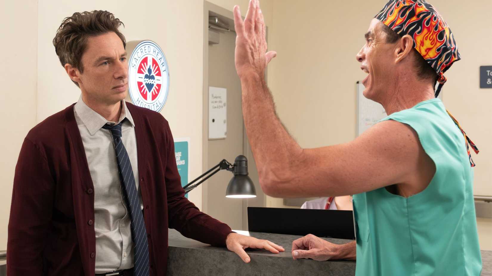 The Todd offering JD a high five in Scrubs