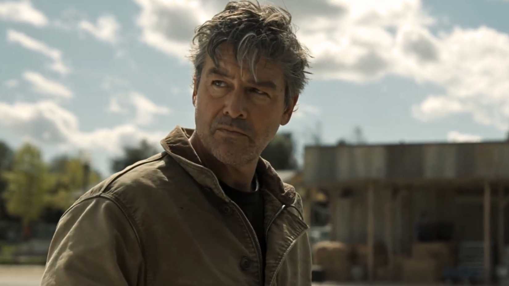 Kyle Chandler wearing a jacket and looking into the distance in 'Lanterns' trailer