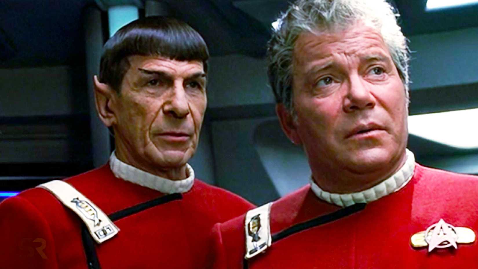 Spock and Kirk standing in red suits in Star Trek: The Next Generation.