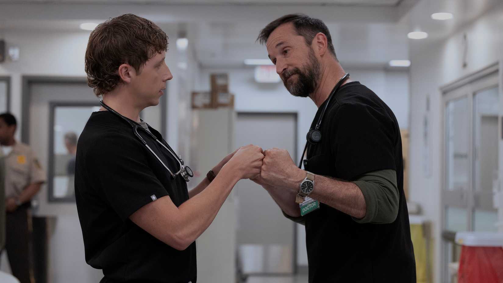 Whitaker and Robby bumping fists in The Pitt.