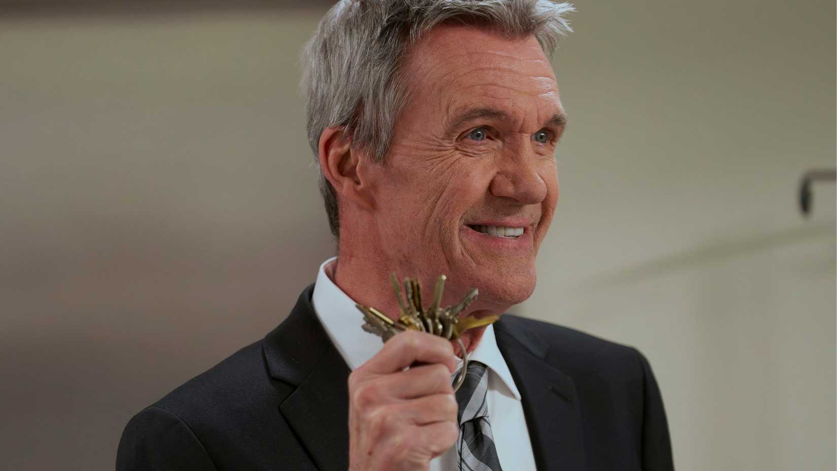 Neil Flynn as the Janitor holding keys in Scrubs.