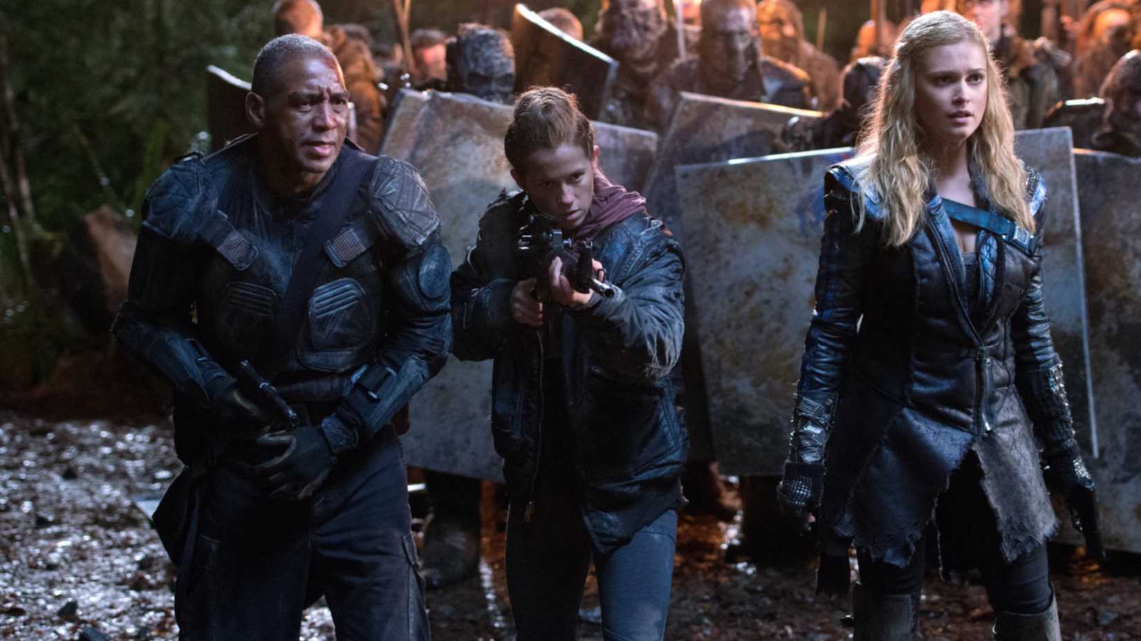 Chris Shields, Katie Stuart, and Eliza Taylor in The 100