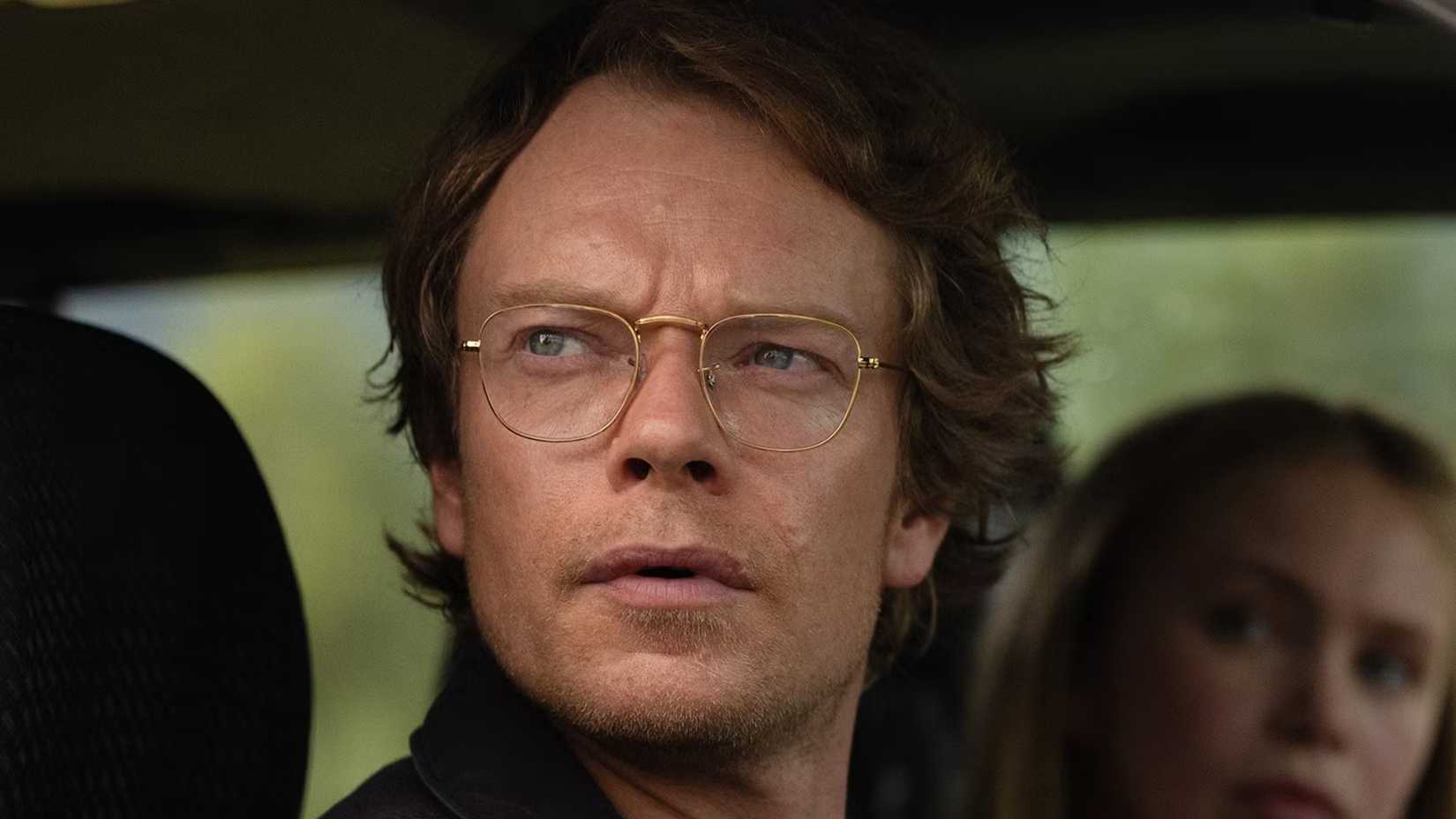 Cleosup of Alfie Allen, Lilly Allens Brothers, as Mr Hanson wearing glasses
