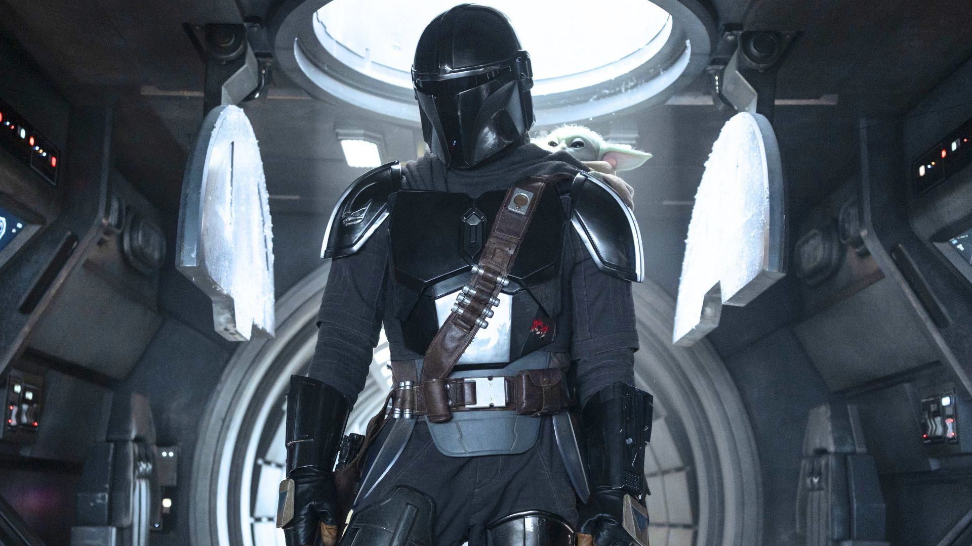 Pedro Pascal as Din Djarin with Grogu on this shoulder in The Mandalorian & Grogu