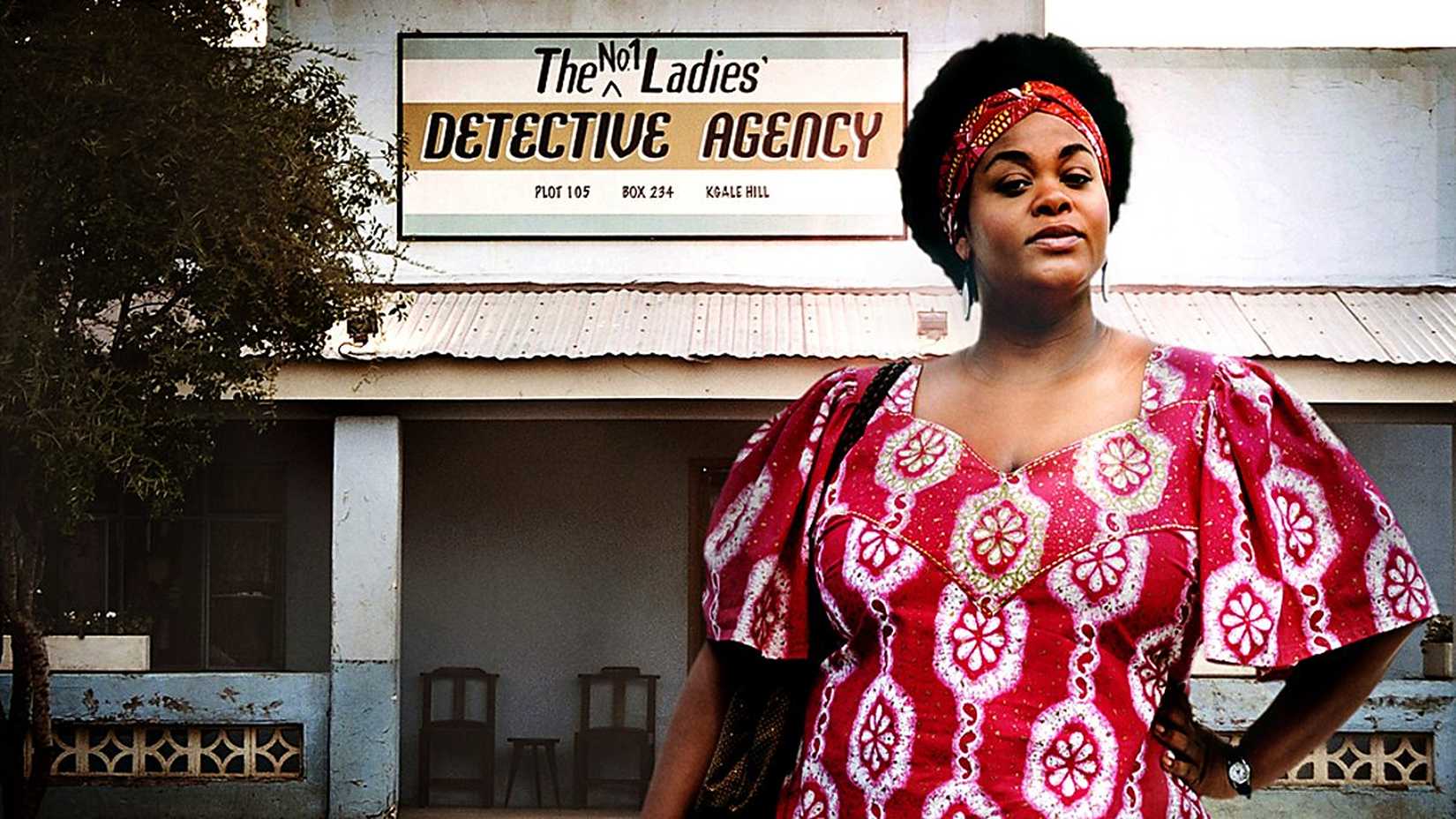 Jill Scott as Precious Ramotswe standing proudly outside her office in The No. 1 Ladies' Detective Agency.