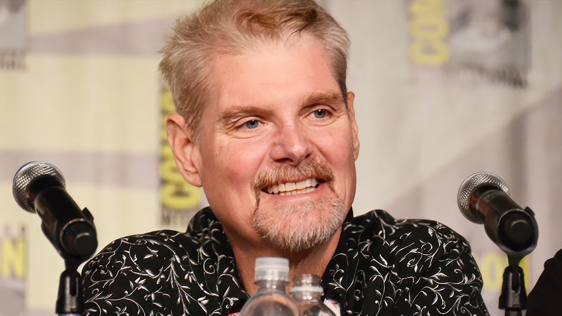 Tom Kane on a San Diego Comic-Con panel.