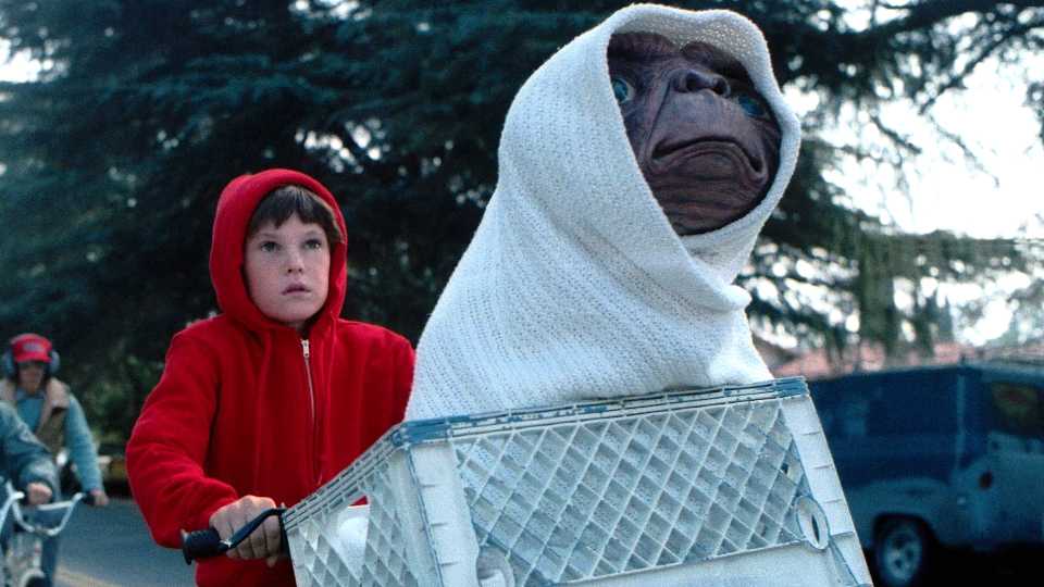 Henry Thomas as Elliott riding his bike in E.T. the Extra-Terrestrial