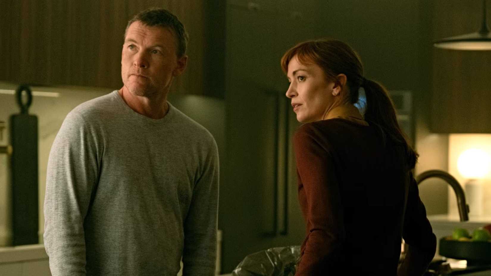 Sam Worthington as David Burroughs and Britt Lower as Rachel Mills in I Will Find You
