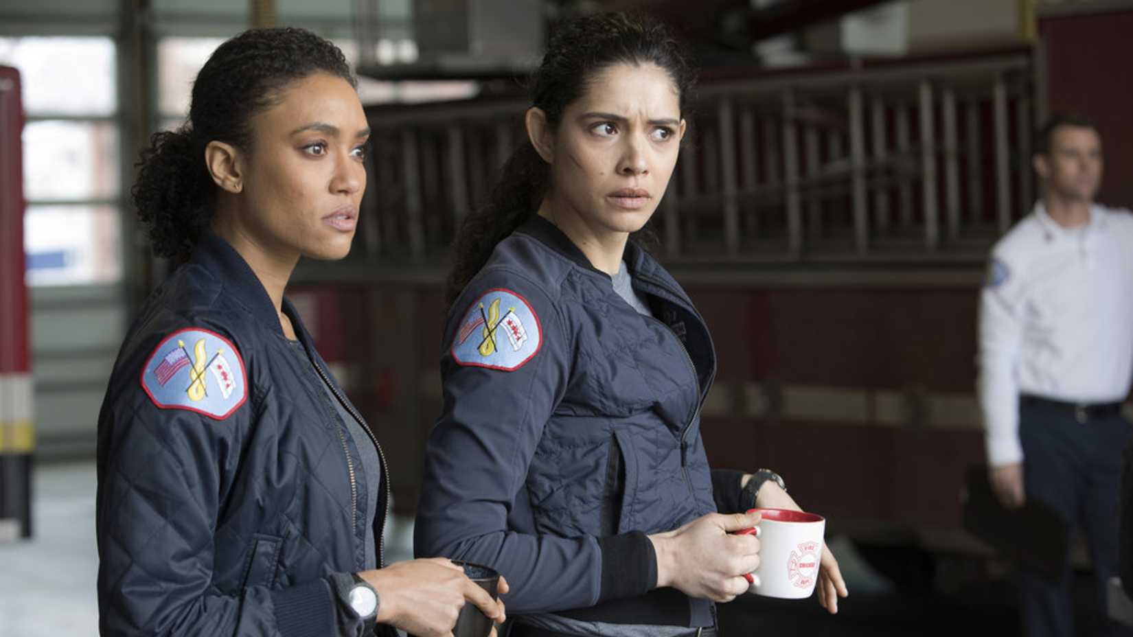 Two women hold coffee mugs in Chicago Fire