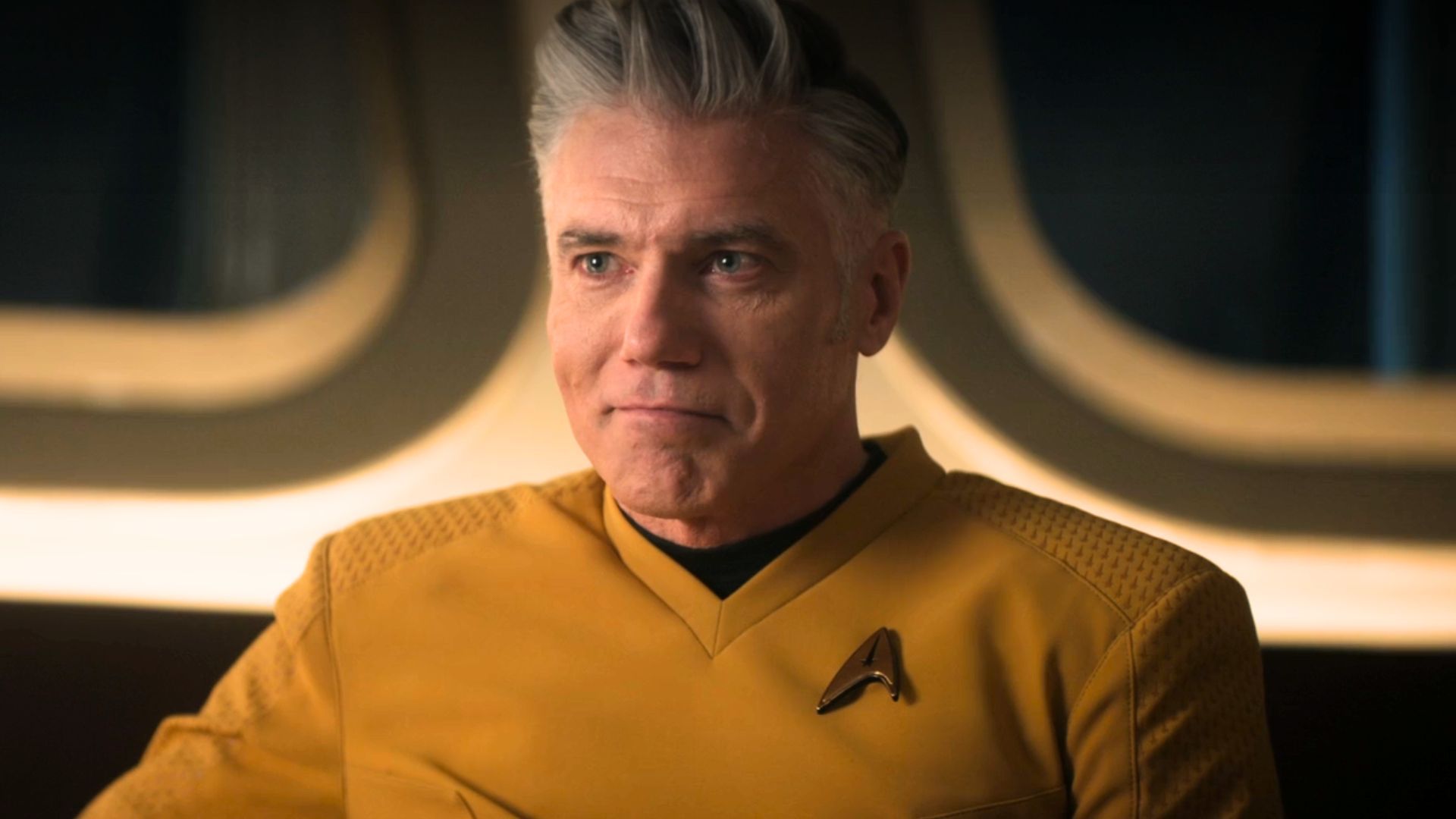 Anson Mount smiling as Captain Pike in Star Trek: Strange New Worlds