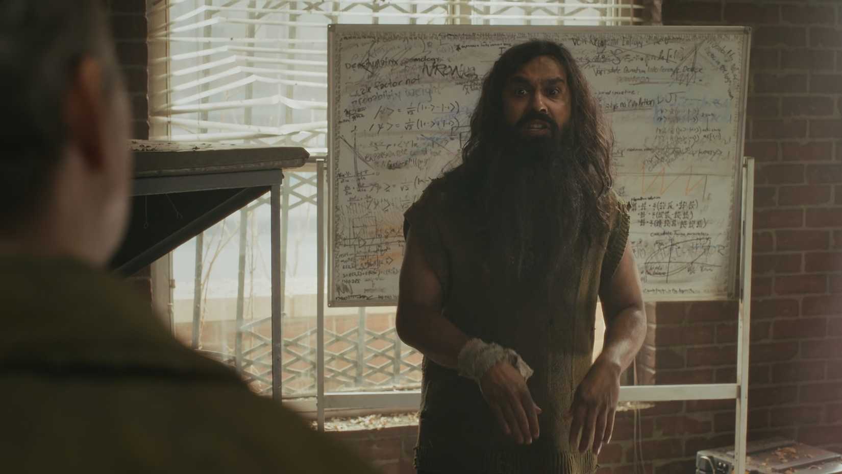 Raj looking dishevelled while standing in Bert's old classroom in Stuart Fails to Save the Universe.