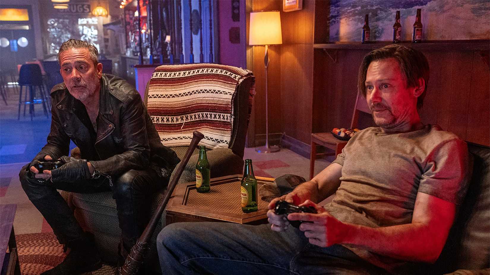 Negan and Dillard playing video games in The Walking Dead: Dead City.