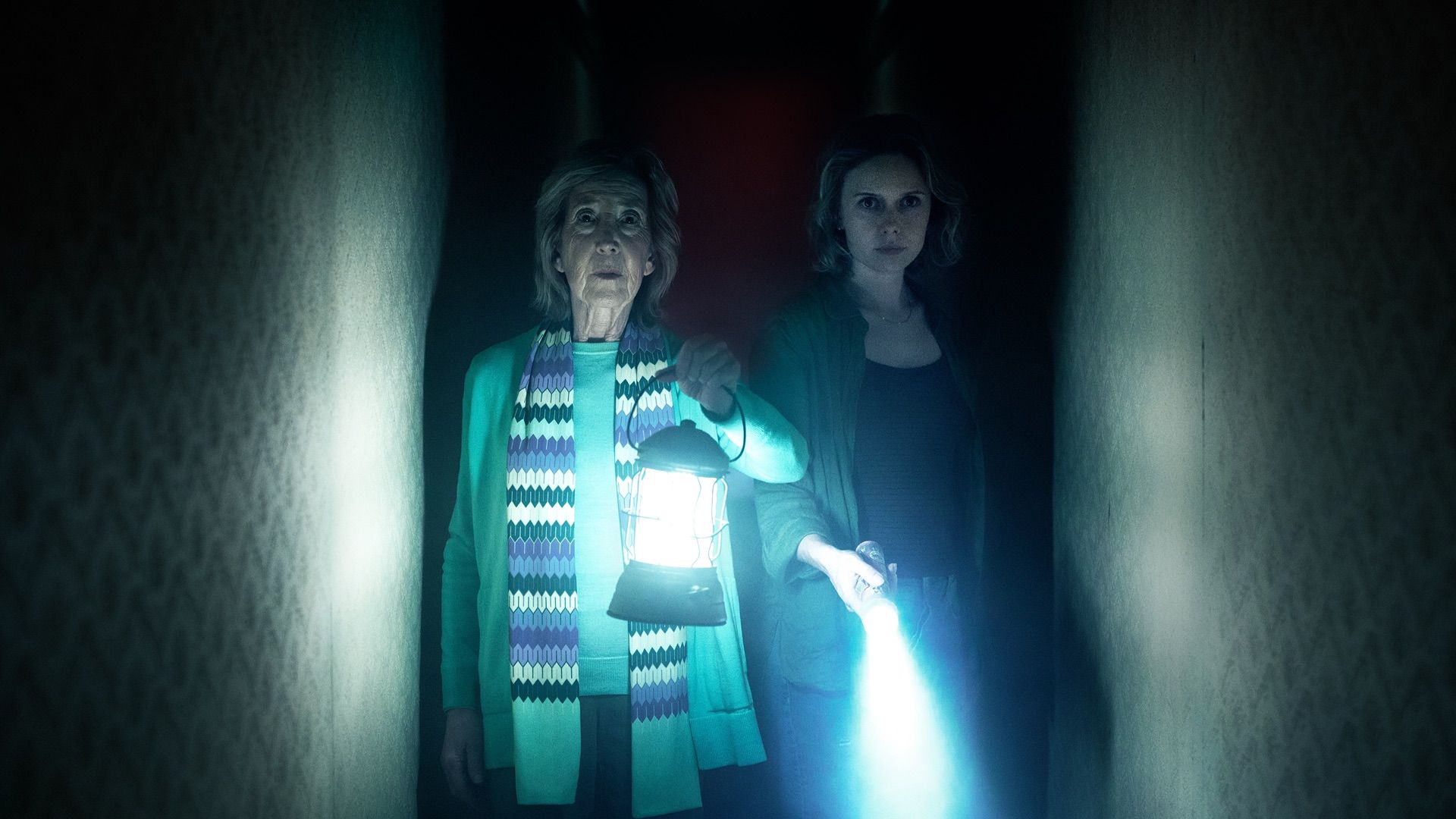 Elise Rainier (Lin Shaye) and Gemma (Amelia Eve) in INSIDIOUS- OUT OF THE FURTHER
