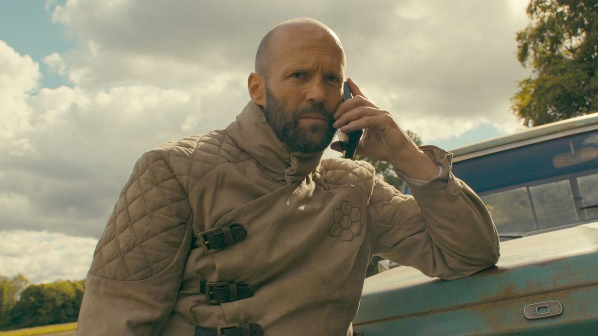 Jason Statham tending to beehives in The Beekeeper