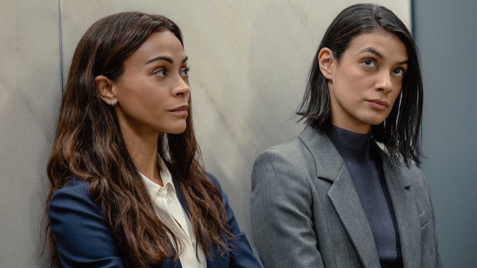 Zoe Saldaña as Joe McNamara and Laysla De Oliveira as Cruz Manuelos in Lioness