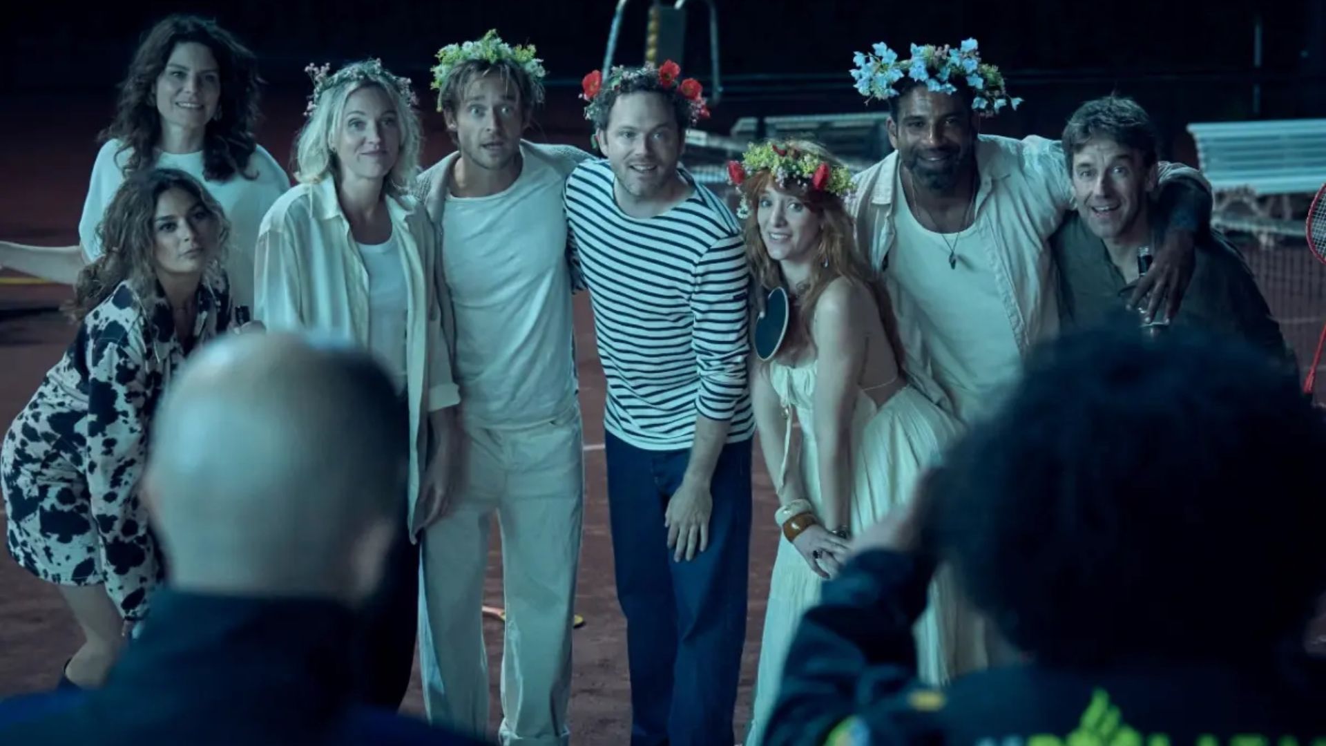 A group of people have their photo taken in the series The Perfect Lie