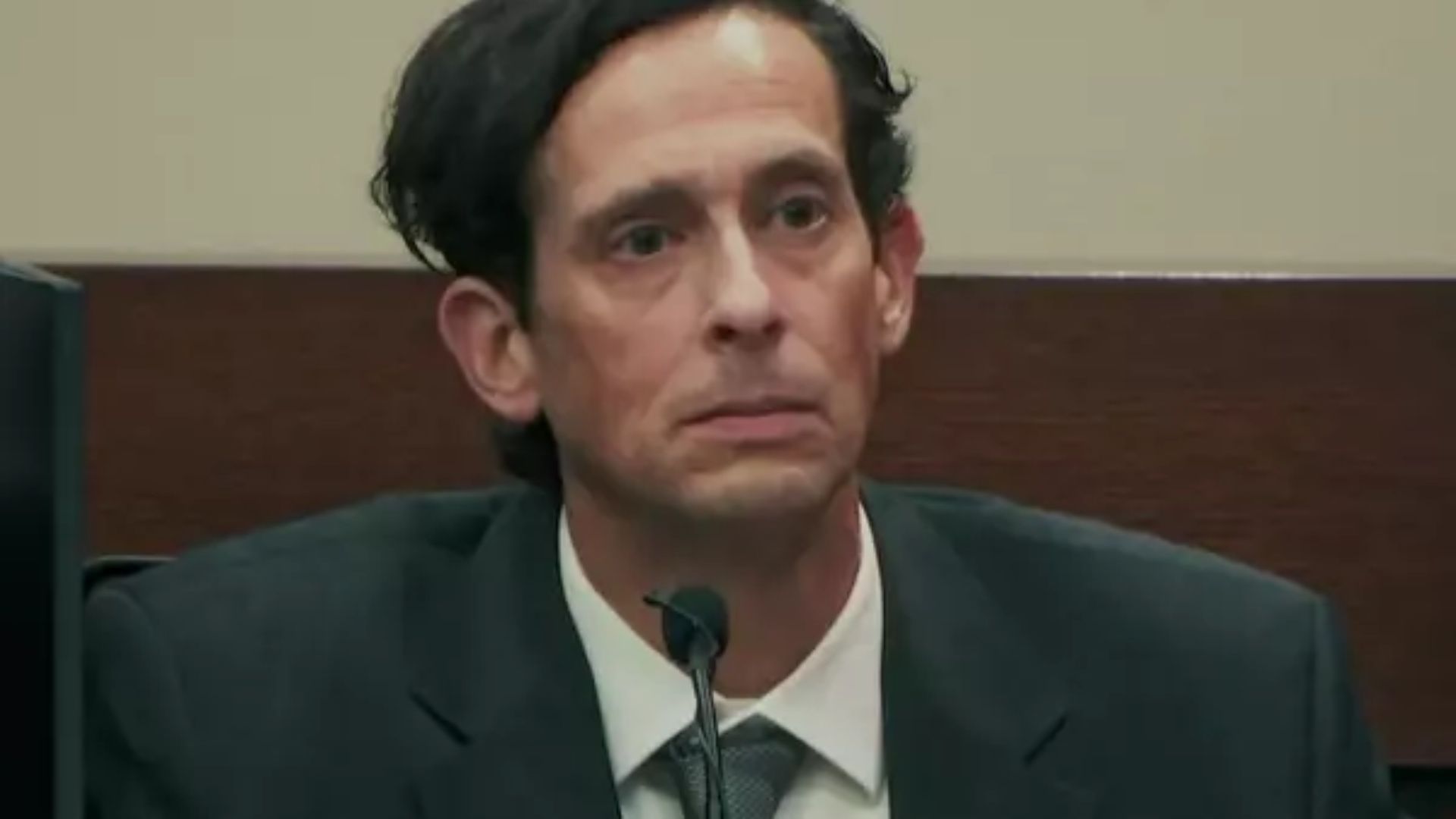 A member of the Adelson family testifies in a still from the docuseries welcome to the family