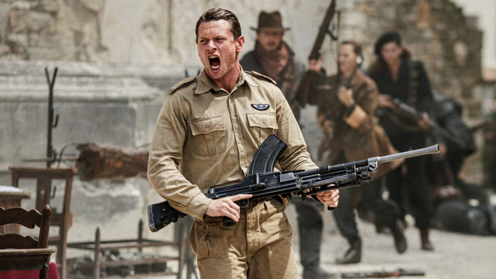 A soldier holds a machine gun in SAS Rogue Heroes