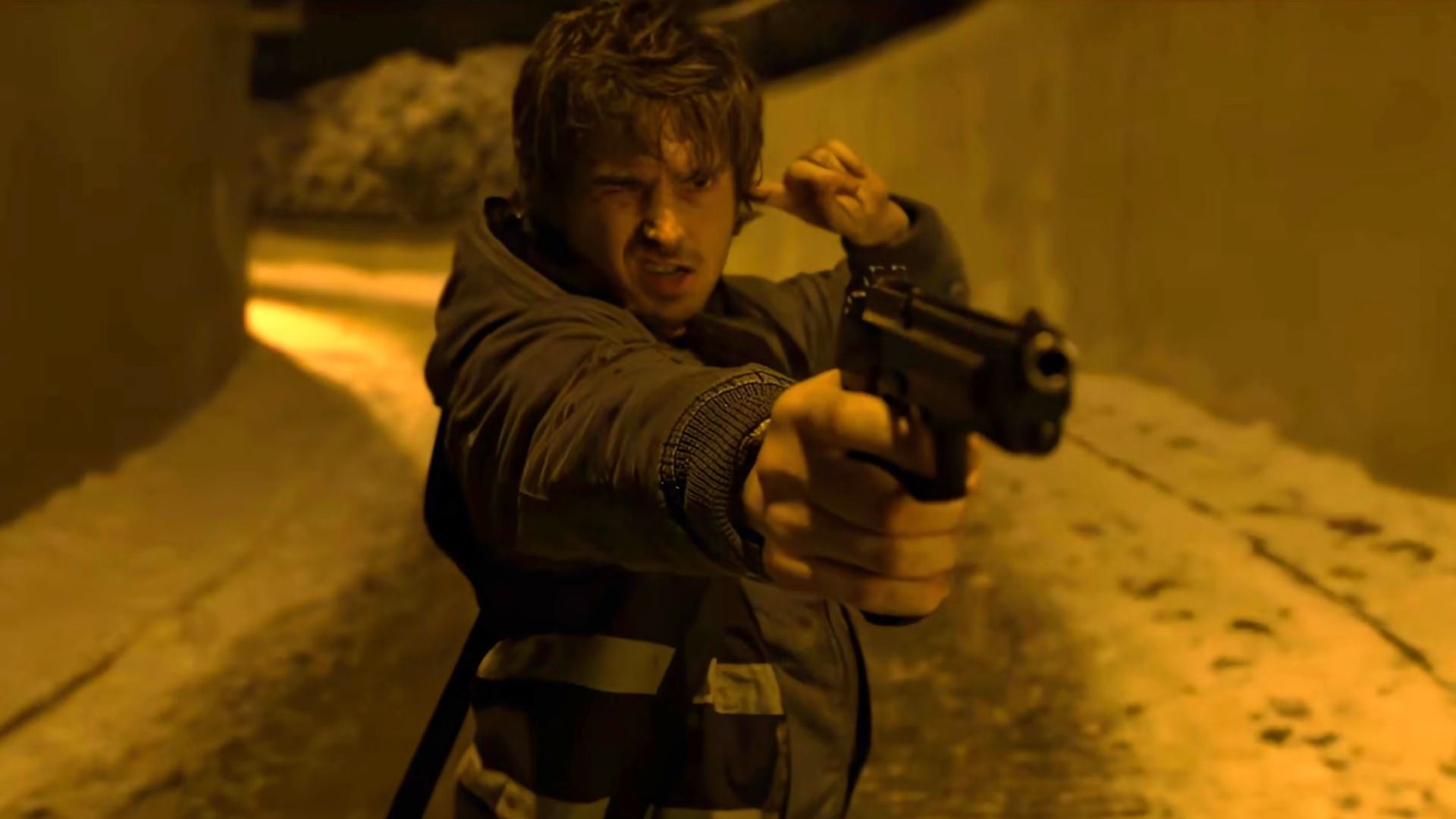 Austin Abrams with a gun in Resident Evil 2026