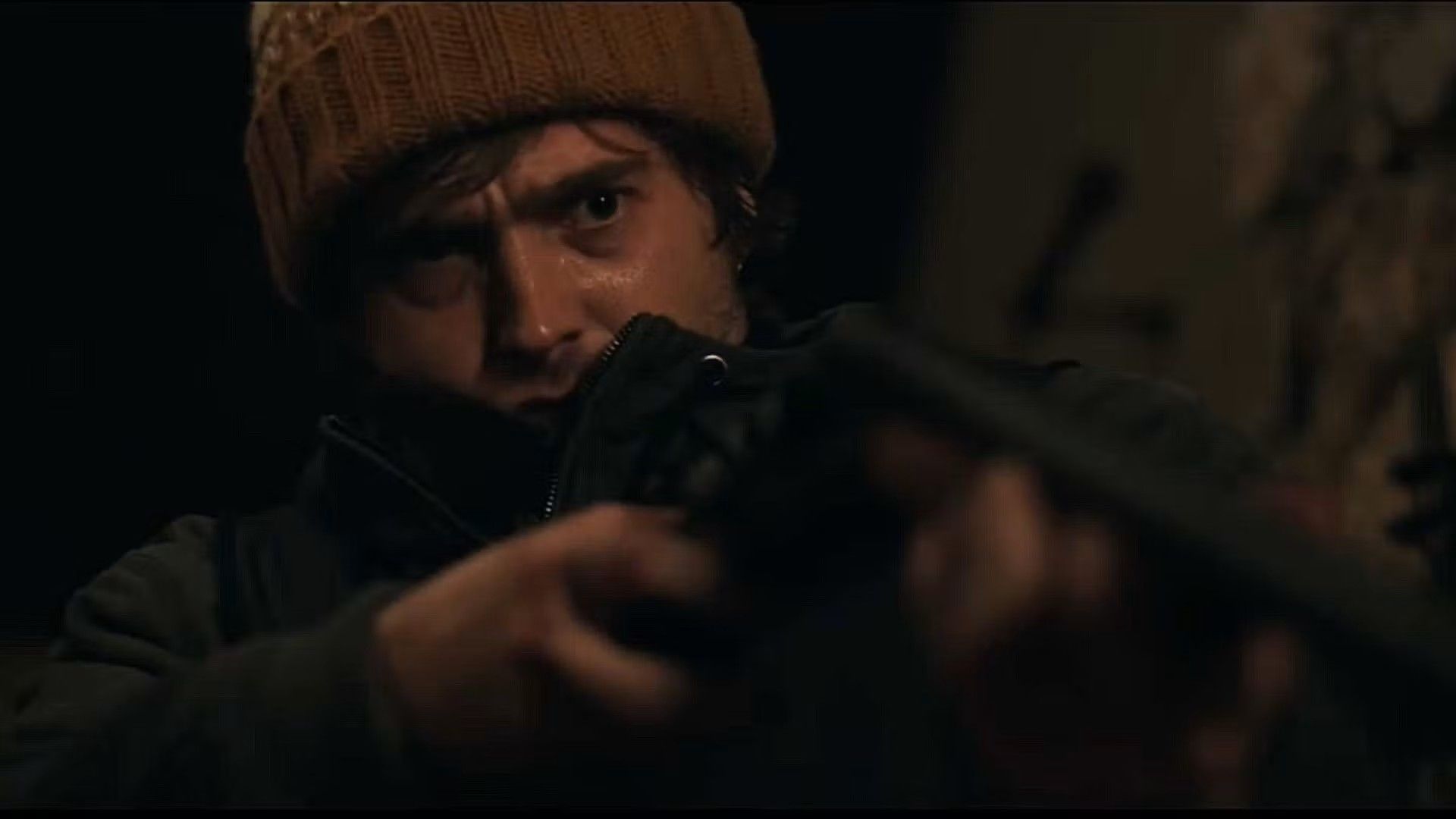 Austin Abrams with a shotgun in Resident Evil 2026