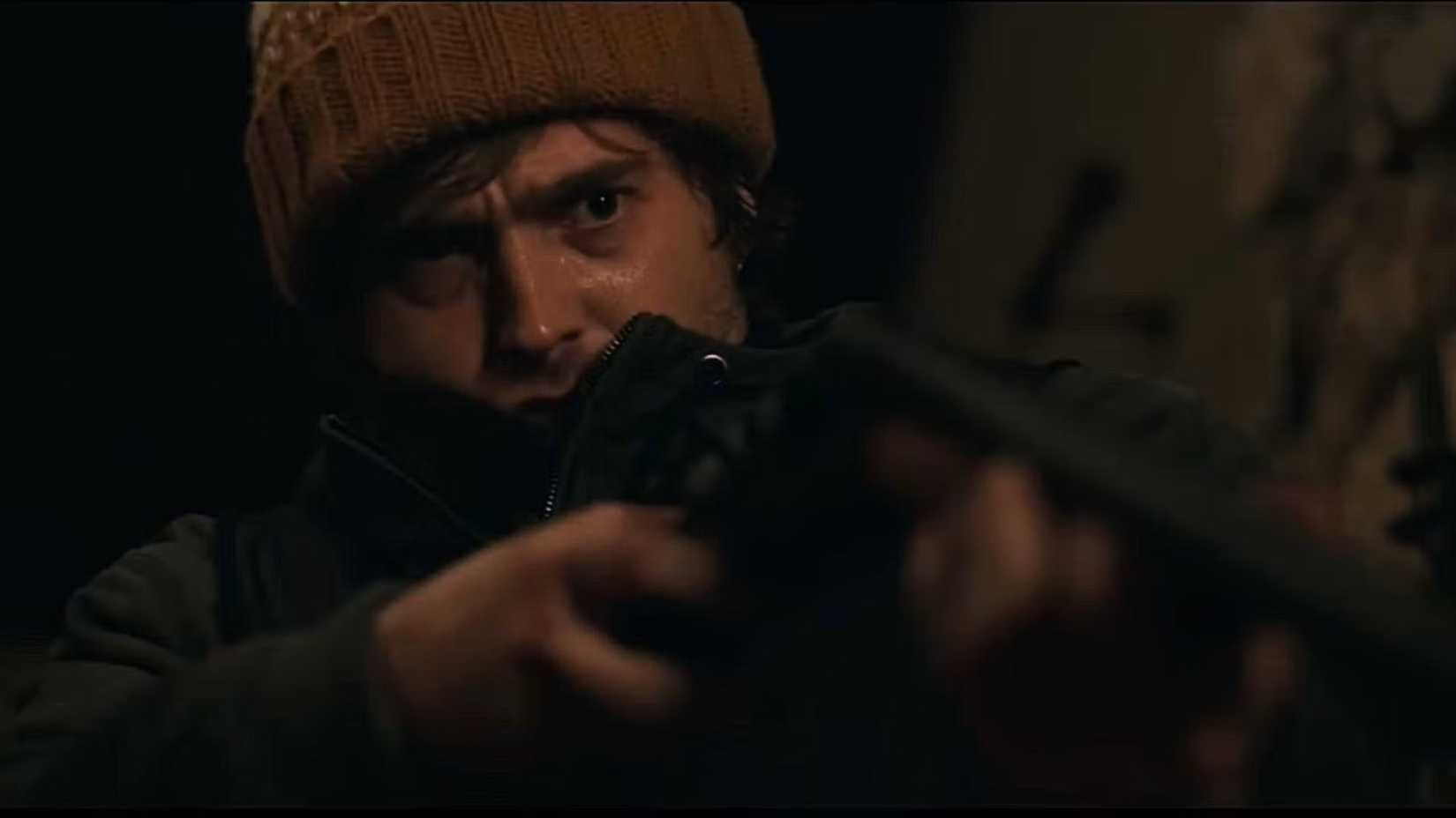Austin Abrams with a shotgun in Resident Evil 2026