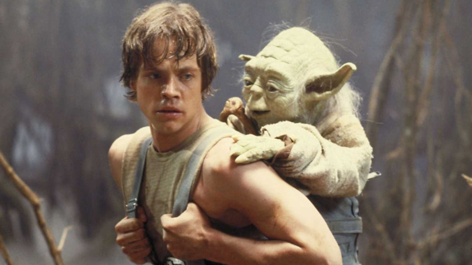 Luke carrying Yoda in The Empire Strikes Back