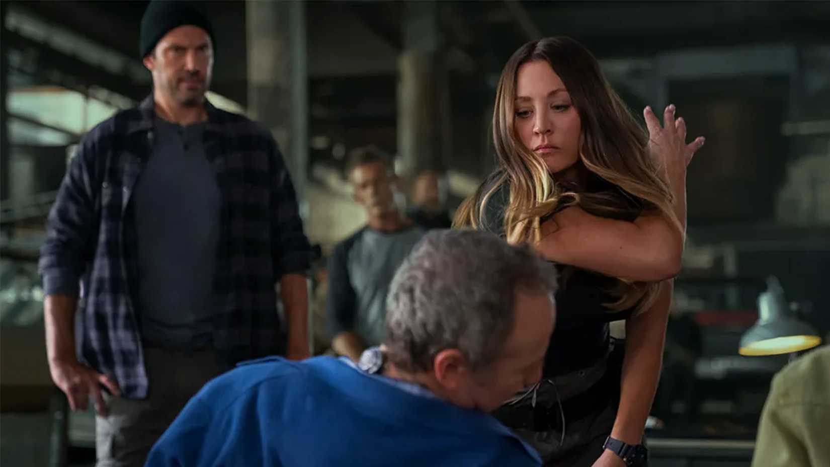 Penny slapping Stuart as Zack and the rest of her rebel army watch in Stuart Fails to Save the Universe.