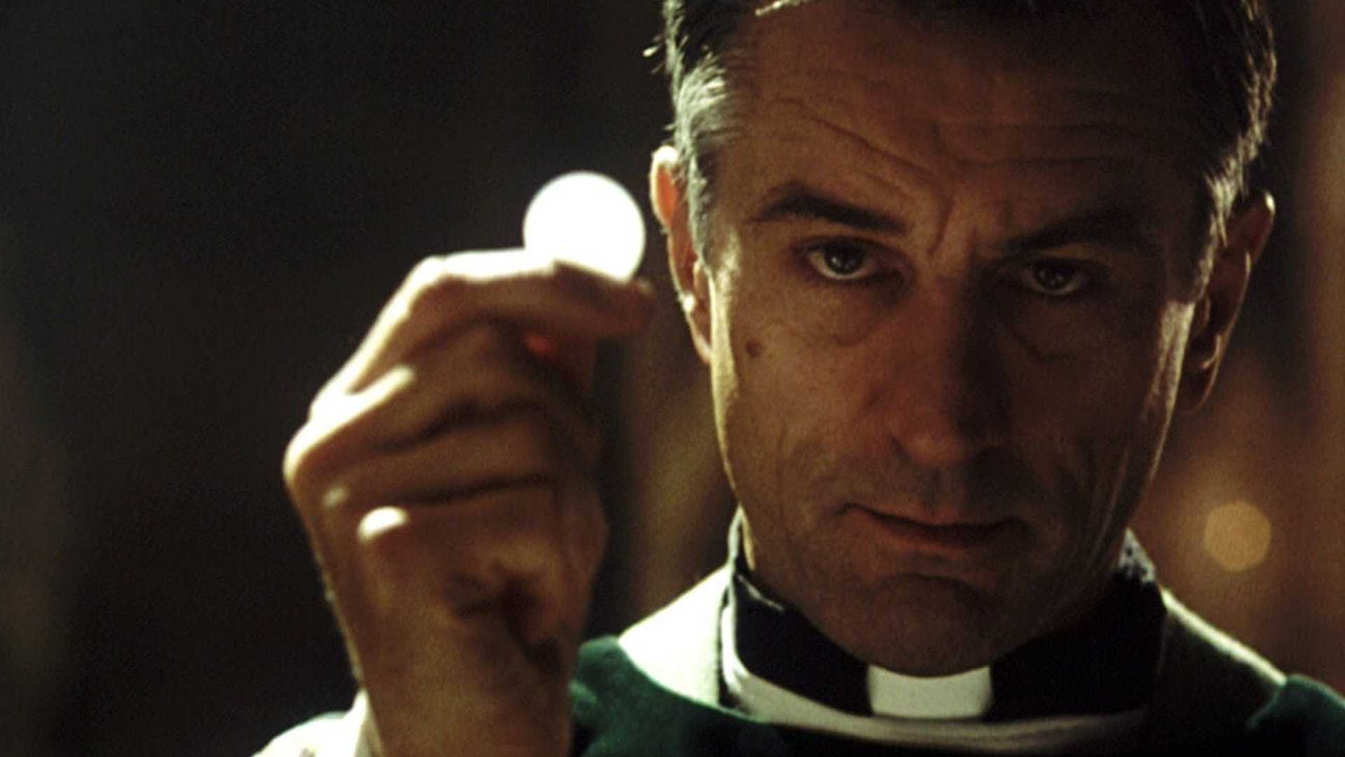 Robert De Niro is a priest in the film Sleepers