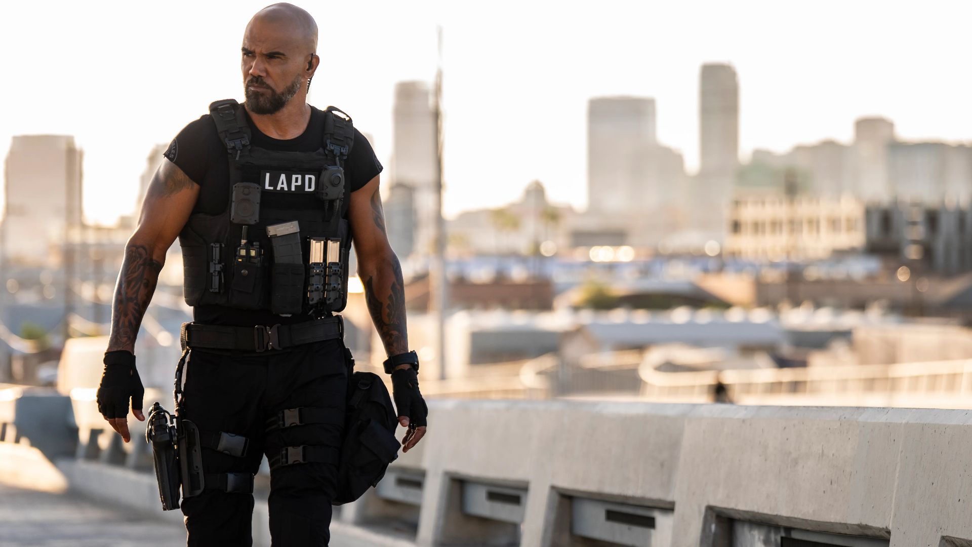 Hondo patrols a rooftop in S.W.A.T. Exiles