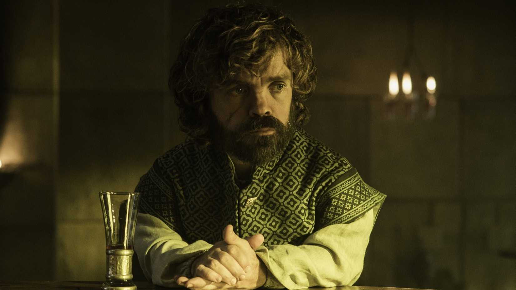 Tyrion sitting at a table in Game of Thrones