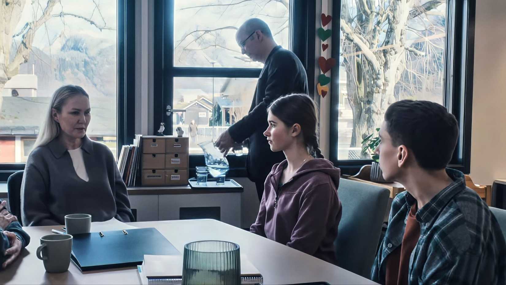 Ellen Dorrit Petersen, Vanessa Ceban, Jonathan Ciprian Breazu Sitting Around A Table In A School Office In Fjord