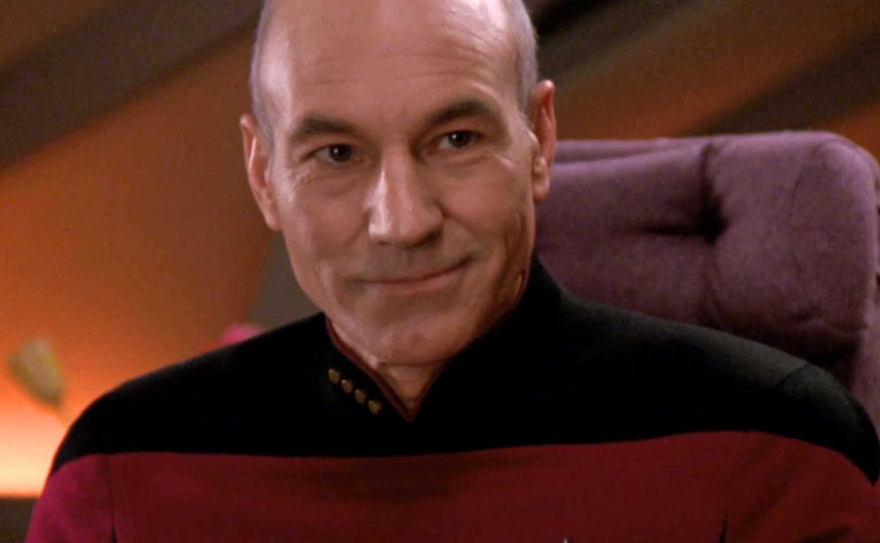 Patrick Stewart smiling as Captain Jean-Luc Picard in Star Trek: The Next Generation