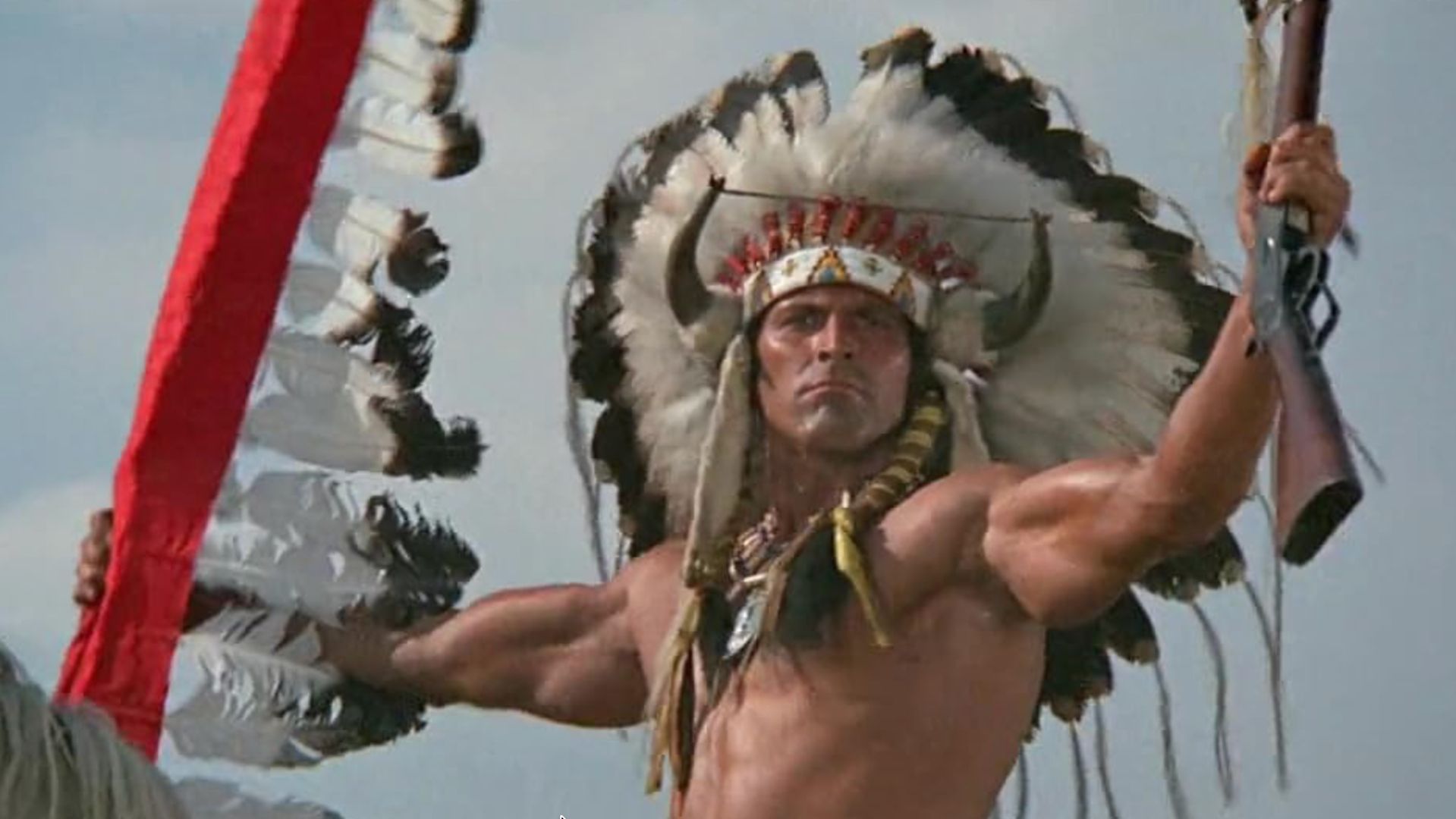 A native holds a rifle in Soldier Blue