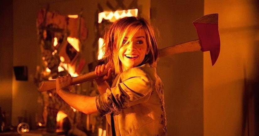 Emma Watson with an axe