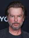 David Spade como Marcus Higgins