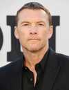 Sam Worthington como David Burroughs em I Will Find You